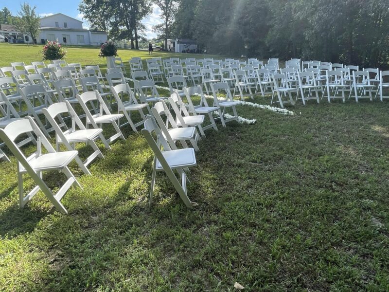 Outdoor wedding ceremony, white wedding chairs, folding chairs, Richmond Wedding Tent, Fredericksburg Virginia Wedding Tent, Home Wedding, At Home Wedding, Tent Rental, Rent a Tent, Backyard Wedding, Tables, Chairs, Linens, DIY Wedding, Stage